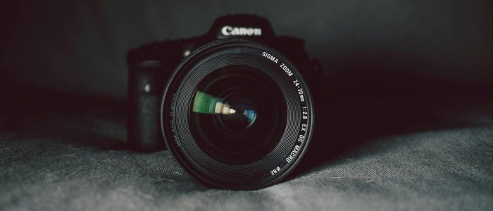 camera sitting on black backdrop